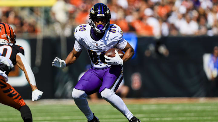 Baltimore Ravens tight end Isaiah Likely runs with the ball against the Cincinnati Bengals.