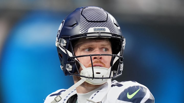 Dec. 28, 2025; Charlotte, North Carolina, USA; Seattle Seahawks quarterback Sam Darnold (14) looks on before the game against the Carolina Panthers at Bank of America Stadium.