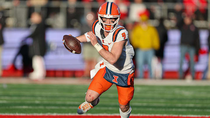 Nov 23, 2024; Piscataway, New Jersey, USA; Illinois Fighting Illini quarterback Luke Altmyer (9) scrambles during the second half against the Rutgers Scarlet Knights at SHI Stadium. Mandatory Credit: Vincent Carchietta-Imagn Images