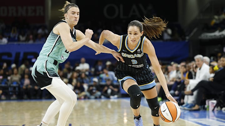 Sep 11, 2025; Chicago, Illinois, USA; Chicago Sky guard Rebecca Allen (9) drives to the basket against New York Liberty guard Sabrina Ionescu (20) during the second half at Wintrust Arena. Mandatory Credit: Kamil Krzaczynski-Imagn Images