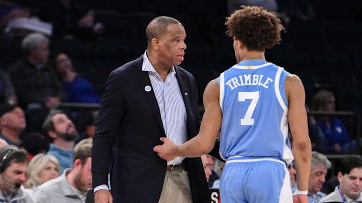 UNC basketball head coach Hubert Davis and guard Seth Trimble