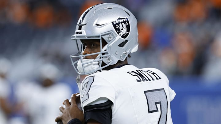 Nov 6, 2025; Denver, Colorado, USA; Las Vegas Raiders quarterback Geno Smith (7) practices before the game at Empower Field at Mile High. Mandatory Credit: Isaiah J. Downing-Imagn Images