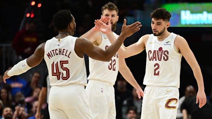 Dec 20, 2024; Cleveland, Ohio, USA; Cleveland Cavaliers guard Ty Jerome (2) celebrates with guard Donovan Mitchell (45) after hitting a three point basket during the first half against the Milwaukee Bucks at Rocket Mortgage FieldHouse. Mandatory Credit: Ken Blaze-Imagn Images Dec 20, 2024; Cleveland, Ohio, USA; Cleveland Cavaliers guard Ty Jerome (2) celebrates with guard Donovan Mitchell (45) after hitting a three point basket during the first half against the Milwaukee Bucks at Rocket Mortgage FieldHouse. Mandatory Credit: Ken Blaze-Imagn Images