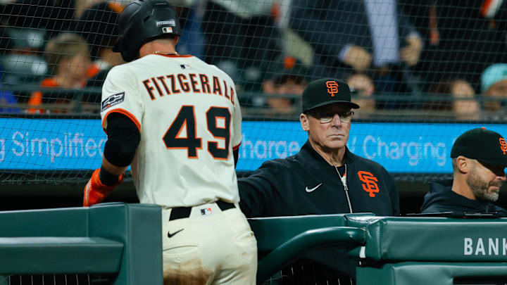 Apr 21, 2025; San Francisco, California, USA; San Francisco Giants manager Bob Melvin (6) congratulates second baseman Tyler Fitzgerald (49) after scoring a run during the fifth inning against the Milwaukee Brewers at Oracle Park. 