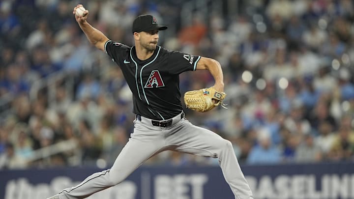Jun 18, 2025; Toronto, Ontario, CAN; Arizona Diamondbacks pitcher Tayler Scott (53) pitches to the Toronto Blue Jays during the sixth inning at Rogers Centre. Mandatory Credit: John E. Sokolowski-Imagn Images