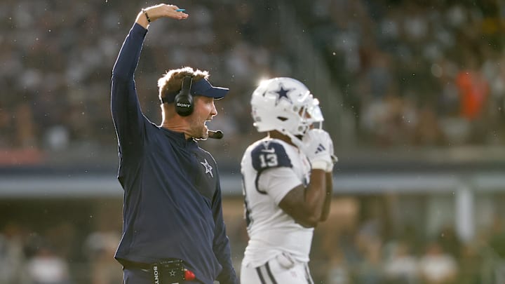 Dallas Cowboys head coach Brian Schottenheimer looks on during the third quarter against the Washington Commanders. Dallas Cowboys head coach Brian Schottenheimer looks on during the third quarter against the Washington Commanders.