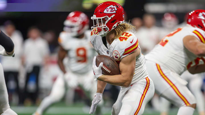 Sep 22, 2024; Atlanta, Georgia, USA; Kansas City Chiefs running back Carson Steele (42) runs the ball against the Atlanta Falcons in the first quarter at Mercedes-Benz Stadium. Mandatory Credit: Brett Davis-Imagn Images