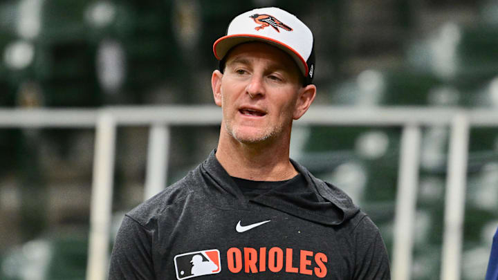 May 21, 2025; Milwaukee, Wisconsin, USA; Baltimore Orioles interim manager Tony Mansolino looks on during batting practice against the Milwaukee Brewers at American Family Field. Mandatory Credit: Benny Sieu-Imagn Images