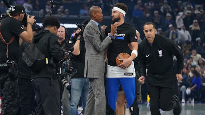 Nov 12, 2024; San Francisco, California, USA; Dallas Mavericks guard Klay Thompson (31) meets with former NBA player Reggie Miller before a game against the Golden State Warriors at the Chase Center. Mandatory Credit: Cary Edmondson-Imagn Images