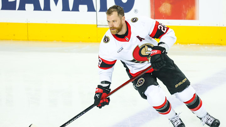 Dec 19, 2024; Calgary, Alberta, CAN; Ottawa Senators right wing Claude Giroux (28) skates during the warmup period against the Calgary Flames at Scotiabank Saddledome. Mandatory Credit: Sergei Belski-Imagn Images