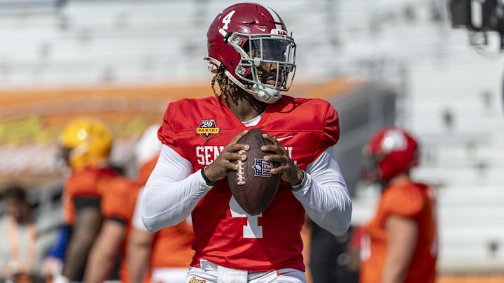 Jan 29, 2025; Mobile, AL, USA; American team quarterback Jalen Milroe of Alabama (4) warms up during Senior Bowl practice for the National team at Hancock Whitney Stadium. Mandatory Credit: Vasha Hunt-Imagn Images