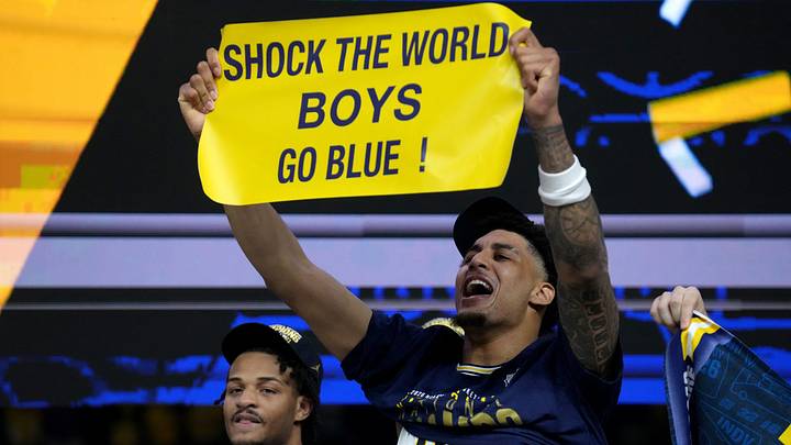 Michigan Wolverines forward Yaxel Lendeborg (23) celebrates the team’s NCAA men's basketball tournament national championship victory Monday, April 6, 2026, after defeating the UConn Huskies 69-63 at Lucas Oil Stadium in Indianapolis. Michigan Wolverines forward Yaxel Lendeborg (23) celebrates the team’s NCAA men's basketball tournament national championship victory Monday, April 6, 2026, after defeating the UConn Huskies 69-63 at Lucas Oil Stadium in Indianapolis.