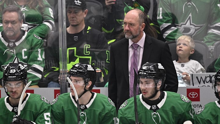 Jan 4, 2025; Dallas, Texas, USA; Dallas Stars head coach Pete DeBoer  looks on from the team bench during the first period against the Utah Hockey Club at the American Airlines Center. Mandatory Credit: Jerome Miron-Imagn Images