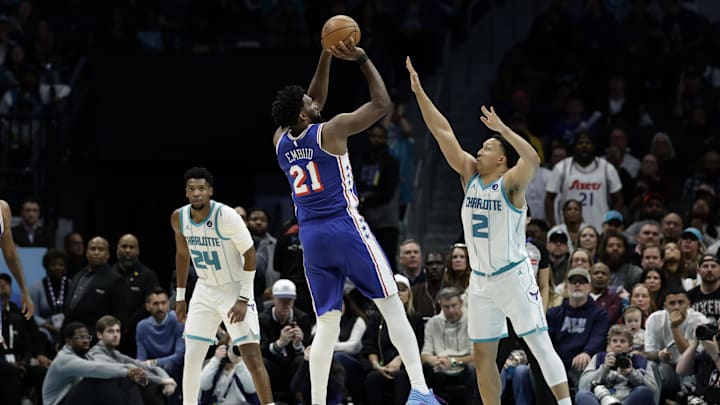 Philadelphia 76ers center/forward Joel Embiid (21) shoots over Charlotte Hornets forward Grant Williams