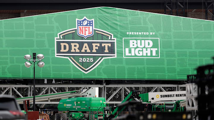 Crews work to raise the roof of the NFL draft theater on April 9 outside Lambeau Field. Crews work to raise the roof of the NFL draft theater on April 9 outside Lambeau Field.