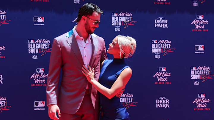 Jul 15, 2025; Atlanta, GA, USA; National League pitcher Paul Skenes (30) of the Pittsburgh Pirates and social media influencer Livvy Dunne pose for a photo on the red carpet before the 2025 MLB All Star Game at Truist Park. Mandatory Credit: Brett Davis-Imagn Images Jul 15, 2025; Atlanta, GA, USA; National League pitcher Paul Skenes (30) of the Pittsburgh Pirates and social media influencer Livvy Dunne pose for a photo on the red carpet before the 2025 MLB All Star Game at Truist Park. Mandatory Credit: Brett Davis-Imagn Images