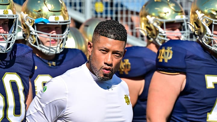 Sep 21, 2024; South Bend, Indiana, USA; Notre Dame Fighting Irish head coach Marcus Freeman prepares to lead his players onto the field for the game against the Miami Redhawks at Notre Dame Stadium. Sep 21, 2024; South Bend, Indiana, USA; Notre Dame Fighting Irish head coach Marcus Freeman prepares to lead his players onto the field for the game against the Miami Redhawks at Notre Dame Stadium.