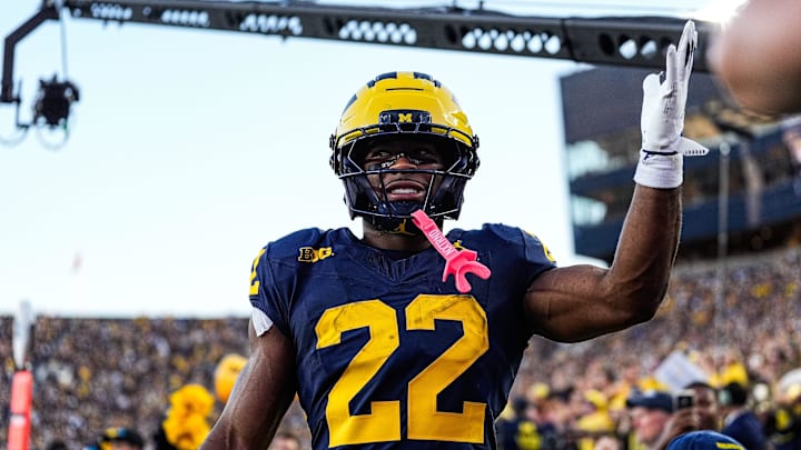 Michigan running back Justice Haynes celebrates a touchdown against New Mexico during the first half at Michigan Stadium in Ann Arbor. Michigan running back Justice Haynes celebrates a touchdown against New Mexico during the first half at Michigan Stadium in Ann Arbor.