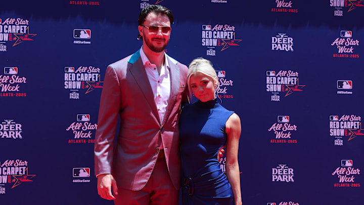 Jul 15, 2025; Atlanta, GA, USA; National League pitcher Paul Skenes (30) of the Pittsburgh Pirates and social media influencer Livvy Dunne pose for a photo on the red carpet before the 2025 MLB All Star Game at Truist Park. Mandatory Credit: Brett Davis-Imagn Images
