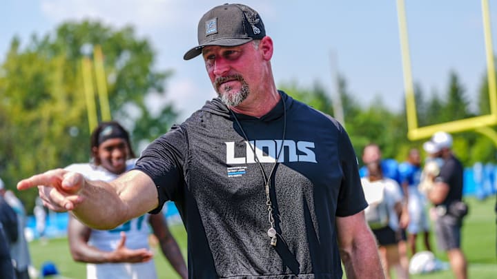 Detroit Lions head coach Dan Campbell talks to staff at the end of the joint practice with the Miami Dolphins at the Lions headquarters and training facility in Allen Park, Thursday, Aug. 14 2025. Detroit Lions head coach Dan Campbell talks to staff at the end of the joint practice with the Miami Dolphins at the Lions headquarters and training facility in Allen Park, Thursday, Aug. 14 2025.