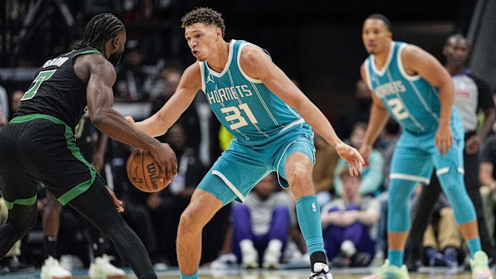 Nov 1, 2024; Charlotte, North Carolina, USA; Charlotte Hornets forward Tidjane Salaun (31) on defense against Boston Celtics guard Jaylen Brown (7) during the second half at the Spectrum Center. Mandatory Credit: Jim Dedmon-Imagn Images Nov 1, 2024; Charlotte, North Carolina, USA; Charlotte Hornets forward Tidjane Salaun (31) on defense against Boston Celtics guard Jaylen Brown (7) during the second half at the Spectrum Center. Mandatory Credit: Jim Dedmon-Imagn Images