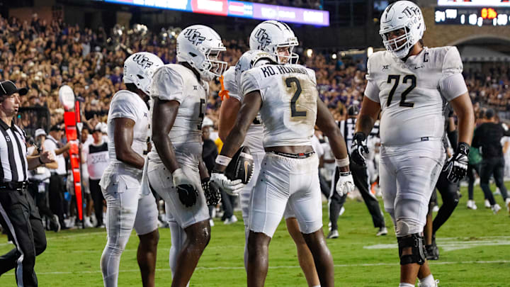 Sep 14, 2024; Fort Worth, Texas, USA; UCF Knights wide receiver Kobe Hudson (2) celebrates after catching the game winning touchdown during the fourth quarter against the TCU Horned Frogs at Amon G. Carter Stadium. Mandatory Credit: Andrew Dieb-Imagn Images