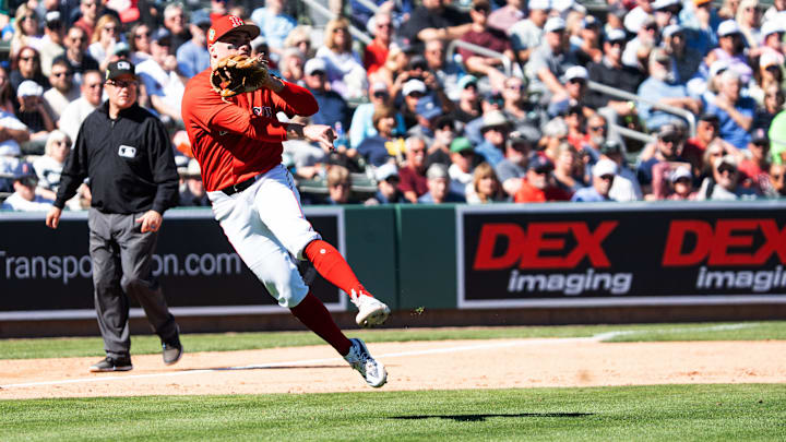 Caleb Durbin of the Boston Red Sox throws an out during spring training game against the Pittsburgh Pirates at JetBlue Park in Fort Myers on Tuesday, Feb. 24, 2026. I