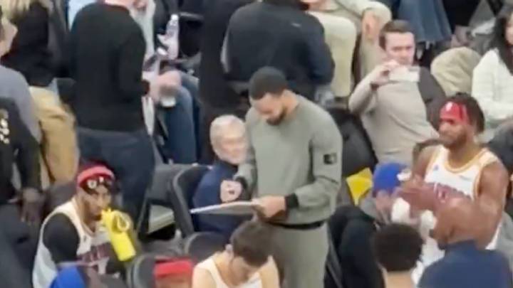 Stephen Curry on the Warriors' bench. 