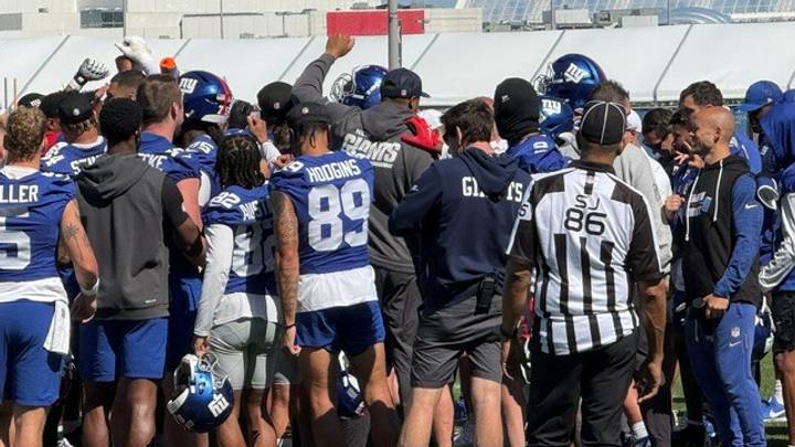 June 2026: New York Giants huddle up after concluding a minicamp practice.