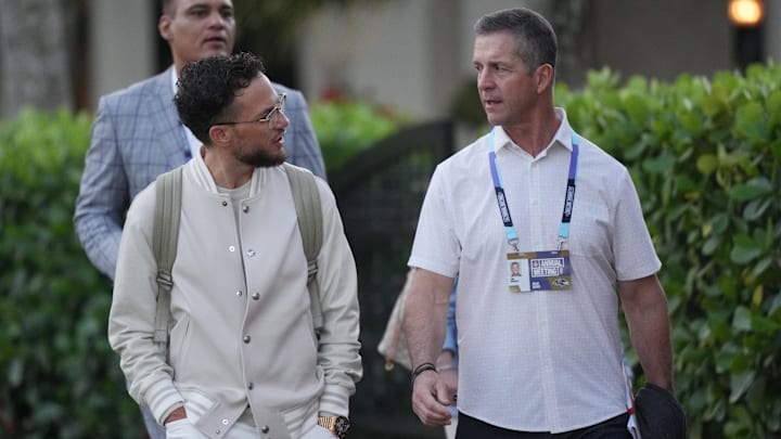 Mar 31, 2025; Palm Beach, FL, USA;  Miami Dolphins head coach Mike McDaniel, left, and Baltimore Ravens head coach John Harbaugh attend the NFL Annual League Meeting at The Breakers. Mandatory Credit: Jim Rassol-Imagn Images
