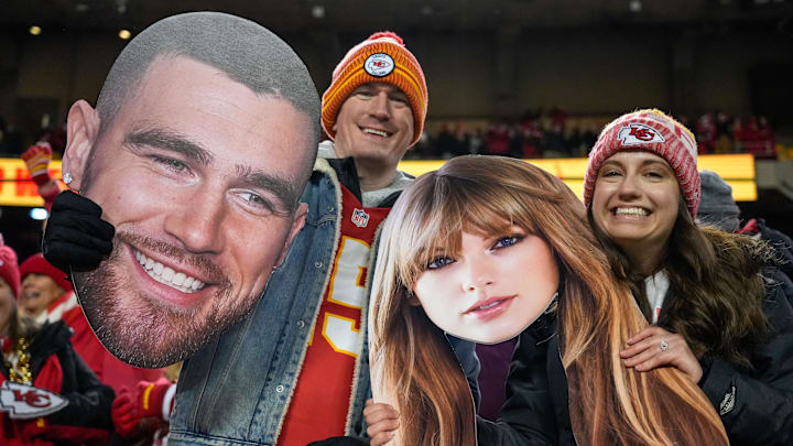 Dec. 31, 2023: Fans wave big heads of Travis Kelce and Taylor Swift during the Kansas City Chiefs' game against the Cincinnati Bengals at Arrowhead Stadium.