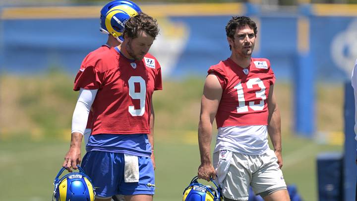 May 28, 2024; Thousand Oaks, CA, USA; Los Angeles Rams quarterbacks Matthew Stafford (9) and Stetson Bennett (13) during OTAs at the team training facility at California Lutheran University. Mandatory Credit: Jayne Kamin-Oncea-Imagn Images May 28, 2024; Thousand Oaks, CA, USA; Los Angeles Rams quarterbacks Matthew Stafford (9) and Stetson Bennett (13) during OTAs at the team training facility at California Lutheran University. Mandatory Credit: Jayne Kamin-Oncea-Imagn Images