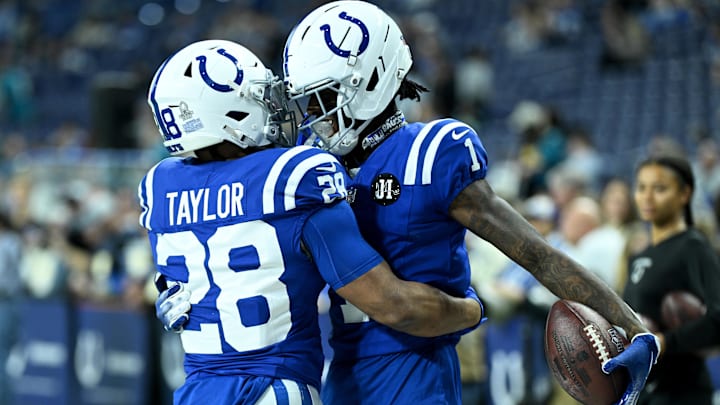 Dec 28, 2025; Indianapolis, Indiana, USA; IIndianapolis Colts running back Jonathan Taylor (28) and cornerback Sauce Gardner (1) warm up before a game against the Jacksonville Jaguars at Lucas Oil Stadium. Mandatory Credit: Robert Goddin-Imagn Images