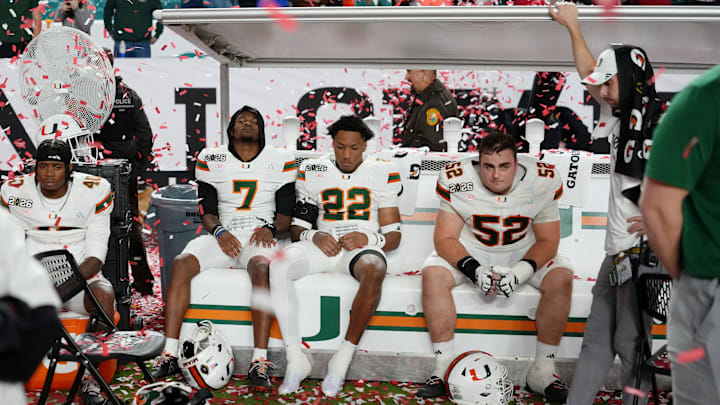 Jan 19, 2026; Miami Gardens, FL, USA; Miami Hurricanes players react after losing to the Indiana Hoosiers in the College Football Playoff National Championship game at Hard Rock Stadium. Mandatory Credit: Kirby Lee-Imagn Images Jan 19, 2026; Miami Gardens, FL, USA; Miami Hurricanes players react after losing to the Indiana Hoosiers in the College Football Playoff National Championship game at Hard Rock Stadium. Mandatory Credit: Kirby Lee-Imagn Images