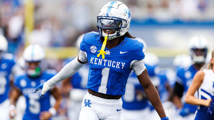 Kentucky Wildcats defensive back Maxwell Hairston runs onto the field before the game against the Ohio Bobcats. Kentucky Wildcats defensive back Maxwell Hairston runs onto the field before the game against the Ohio Bobcats.