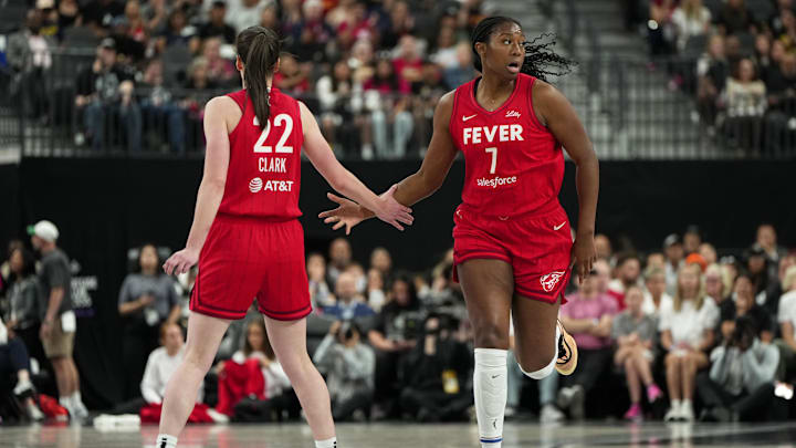 Jun 22, 2025; Las Vegas, Nevada, USA; Indiana Fever center Aliyah Boston (7) celebrates with guard Caitlin Clark (22) after scoring against the Las Vegas Aces during the first half of a WNBA basketball game at T-Mobile Arena. Mandatory Credit: Lucas Peltier-Imagn Images