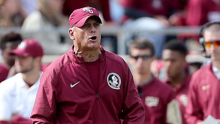 Nov 14, 2015; Tallahassee, FL, USA; Florida State Seminoles assistant head coach Rick Trickett shouts at an official while playing against the North Carolina State Wolfpack at Doak Campbell Stadium.
