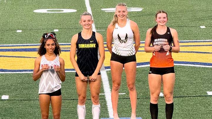 Harper Sheehan of Hayward (third from left) has been voted High School on SI Wisconsin Girls Track and Field's Top Athlete of 2026. Also pictured from left on the podium following the 200-meter finals at the WIAA Division 2 Rice Lake sectional: Reminisce Hohman of Altoona, Elise Gibeault of Tomahawk, and Grace Krejci of Bloomer. Harper Sheehan of Hayward (third from left) has been voted High School on SI Wisconsin Girls Track and Field's Top Athlete of 2026. Also pictured from left on the podium following the 200-meter finals at the WIAA Division 2 Rice Lake sectional: Reminisce Hohman of Altoona, Elise Gibeault of Tomahawk, and Grace Krejci of Bloomer.