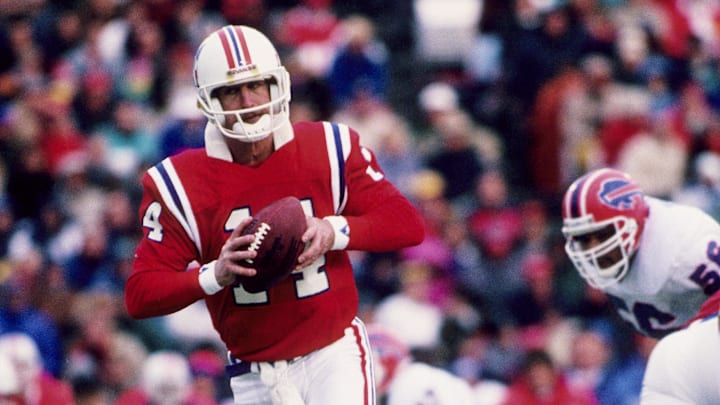 Nov 19, 1989; Foxboro, MA, USA; New England Patriots  quarterback Steve Grogan (14) in action against the Buffalo Bills at Foxboro Stadium. Mandatory Credit: Imagn Images