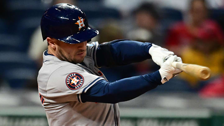 Sep 27, 2024; Cleveland, Ohio, USA; Houston Astros third baseman Alex Bregman (2) hits a sacrifice fly during the first inning against the Cleveland Guardians at Progressive Field Sep 27, 2024; Cleveland, Ohio, USA; Houston Astros third baseman Alex Bregman (2) hits a sacrifice fly during the first inning against the Cleveland Guardians at Progressive Field