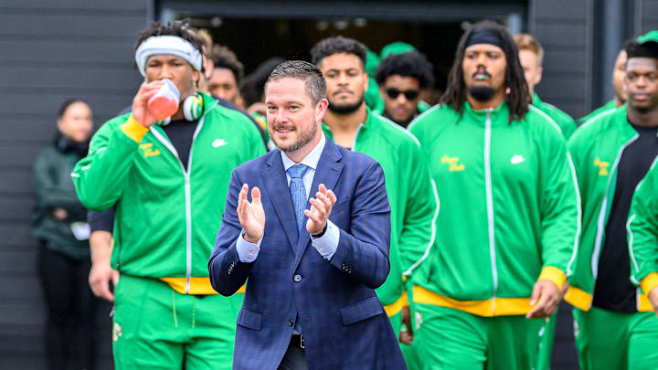 Oct 21, 2023; Eugene, Oregon, USA; Oregon Ducks head coach Dan Lanning leads the team parade before a game against the Washington State Cougars at Autzen Stadium. Mandatory Credit: Craig Strobeck-Imagn Images
