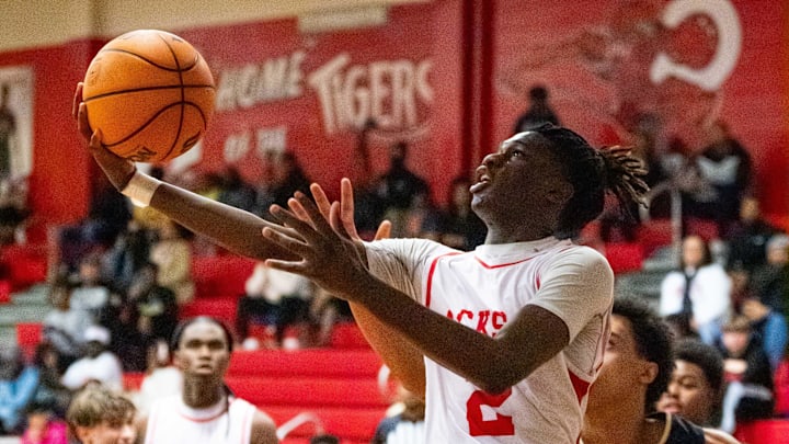 Jackson Tigers David Wilson (2) drives to the basket for two. The Gateway Conference boys basketball semifinal between Jackson (20-1) and Paxon (12-6), was held at Andrew Jackson High School in Jacksonville, Fl. Thursday night, January 23, 2025. The Paxon Golden Eagles lost to the Jackson Tigers 38-68. [Doug Engle/Florida Times-Union]2025