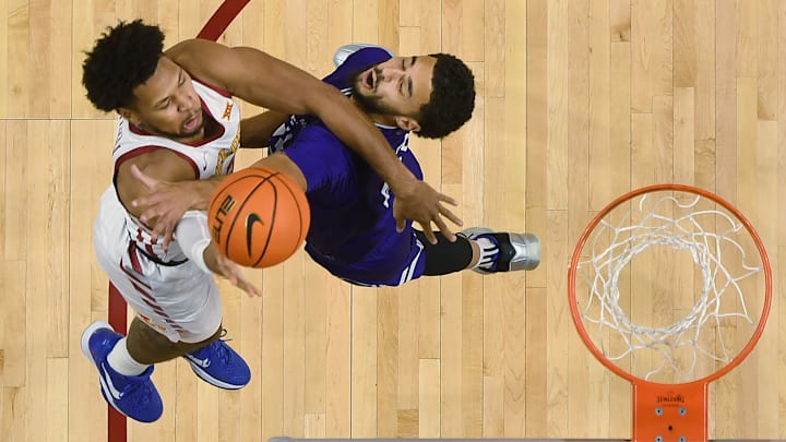 Iowa State Cyclones forward Joshua Jefferson (5) shoots the ball as Stonehill Skyhawks forward Raymond Espinal-Guzman (13) defends during the first half in the NCAA basketball on Nov. 17, 2025, at Hilton Coliseum in Ames, Iowa.
