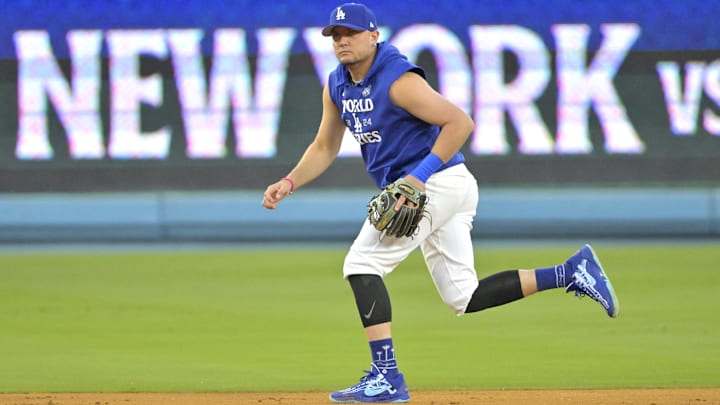 Oct 24, 2024; Los Angeles, CA, USA; Los Angeles Dodgers shortstop Miguel Rojas (11) during the team workout prior to game one of the World Series against the New York Yankees at Dodger Stadium. Mandatory Credit: Jayne Kamin-Oncea-Imagn Images Oct 24, 2024; Los Angeles, CA, USA; Los Angeles Dodgers shortstop Miguel Rojas (11) during the team workout prior to game one of the World Series against the New York Yankees at Dodger Stadium. Mandatory Credit: Jayne Kamin-Oncea-Imagn Images
