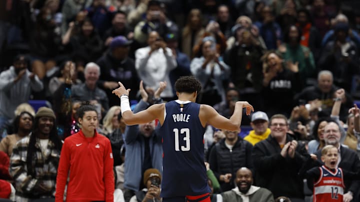 Dec 26, 2024; Washington, District of Columbia, USA; Washington Wizards guard Jordan Poole (13) celebrates after making a go-ahead three point field goal against the Charlotte Hornets in the final seconds in the fourth quarter at Capital One Arena. Mandatory Credit: Geoff Burke-Imagn Images