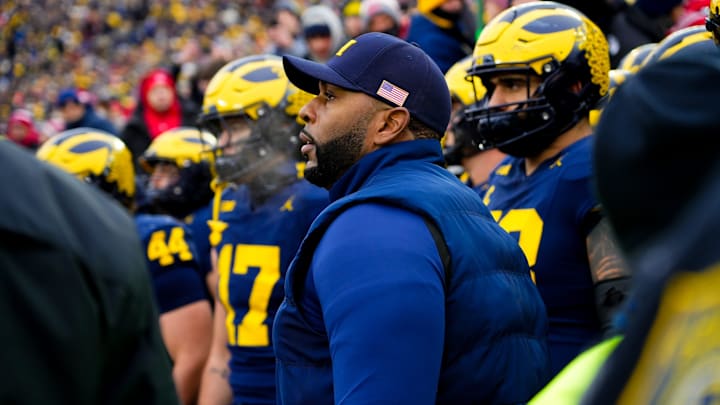 Michigan Wolverines head coach Sherrone Moore prepares to take the field before the NCAA football game against the Ohio State Buckeyes at Michigan Stadium. Michigan Wolverines head coach Sherrone Moore prepares to take the field before the NCAA football game against the Ohio State Buckeyes at Michigan Stadium.