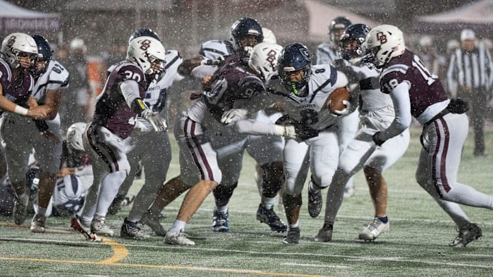 Nov 22, 2024; Ramsey, NJ, USA; St. Augustine Prep at Don Bosco Prep in the NJSIAA Non-Public A football semifinals. SA #8 Julian Turney tries to avoid a tackle.