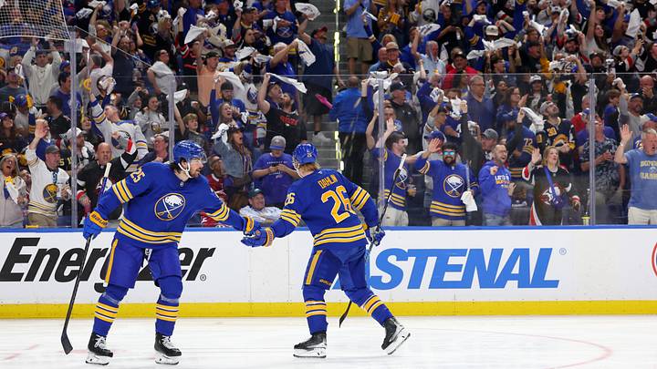 May 18, 2026; Buffalo, New York, USA; Buffalo Sabres defenseman Rasmus Dahlin (26) celebrates his goal with defenseman Owen Power (25) during the third period against the Montréal Canadiens in game seven of the second round of the 2026 Stanley Cup Playoffs at KeyBank Center. Mandatory Credit: Timothy T. Ludwig-Imagn Images