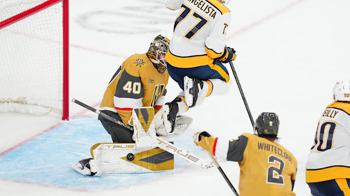 Jan 17, 2026; Las Vegas, Nevada, USA; Vegas Golden Knights goaltender Akira Schmid (40) makes a save as Nashville Predators right wing Luke Evangelista (77) screens him during the third period at T-Mobile Arena. Mandatory Credit: Stephen R. Sylvanie-Imagn Images Jan 17, 2026; Las Vegas, Nevada, USA; Vegas Golden Knights goaltender Akira Schmid (40) makes a save as Nashville Predators right wing Luke Evangelista (77) screens him during the third period at T-Mobile Arena. Mandatory Credit: Stephen R. Sylvanie-Imagn Images