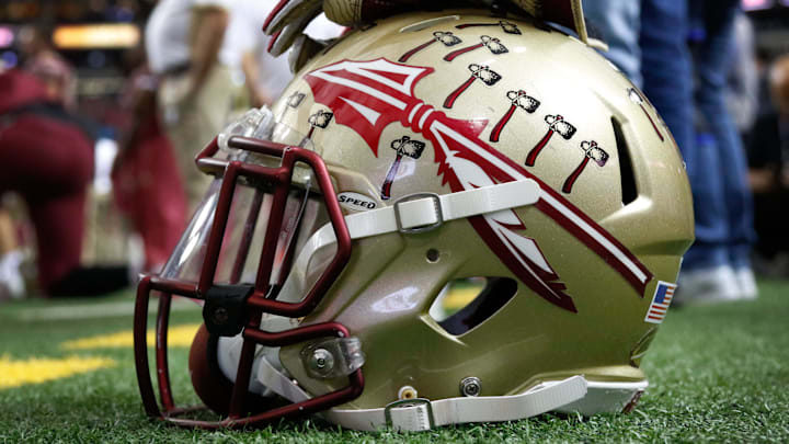 Dec 31, 2015; Atlanta, GA, USA; Detailed view of Florida State Seminoles helmet on the sidelines before a game against the Houston Cougars in the 2015 Chick-fil-A Peach Bowl at the Georgia Dome. Mandatory Credit: Brett Davis-Imagn Images